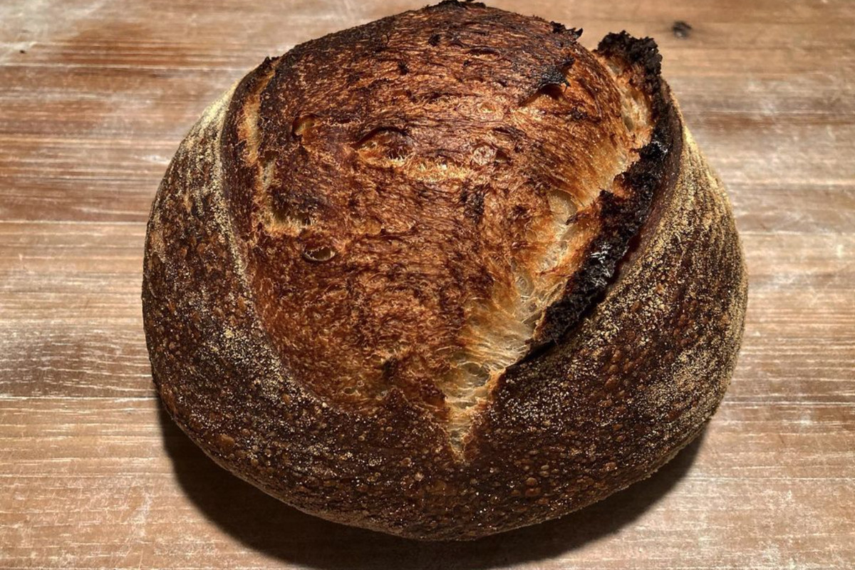 A round loaf of sourdough bread.