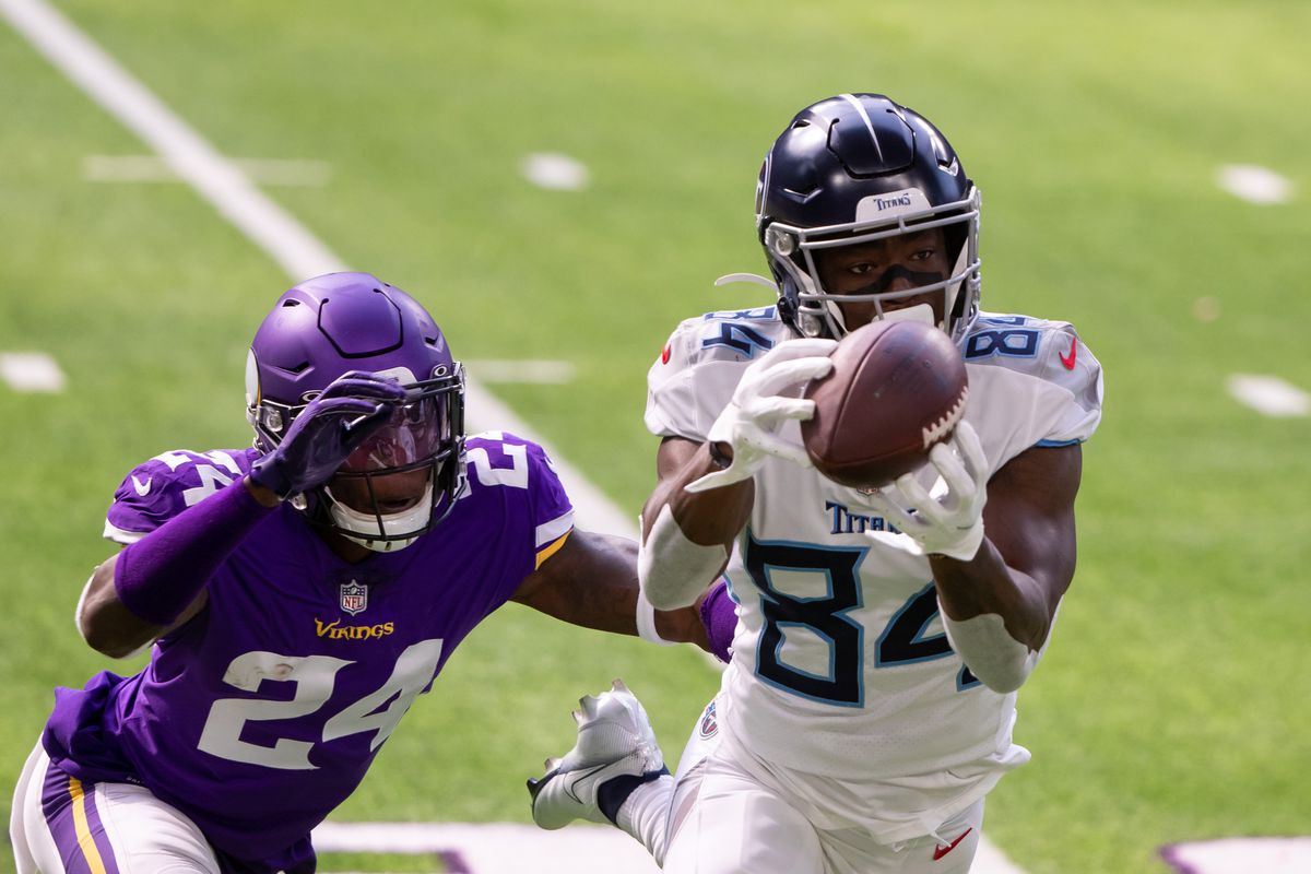 Tennessee Titans wide receiver Corey Davis catches a pass in the first quarter against the Minnesota Vikings defensive back Holton Hill at U.S. Bank Stadium.&nbsp;