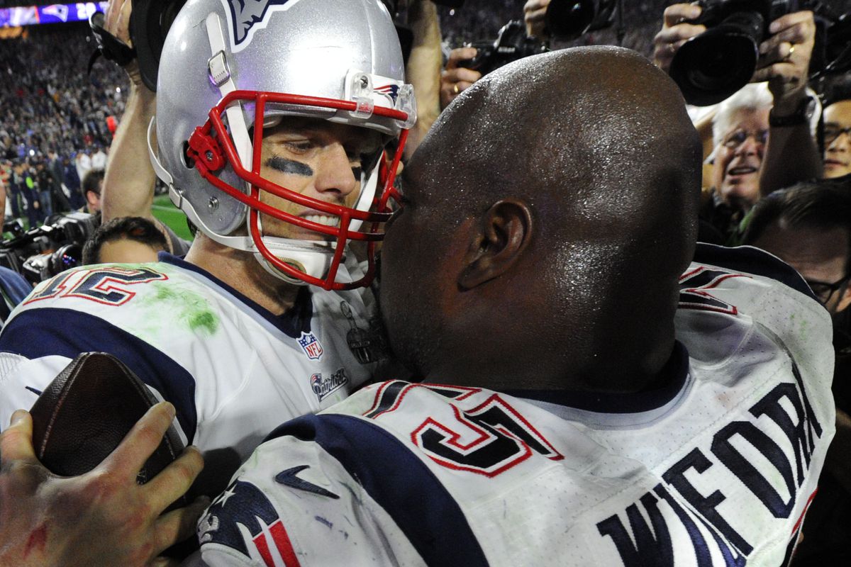Tom Brady and Vince Wilfork share a moment