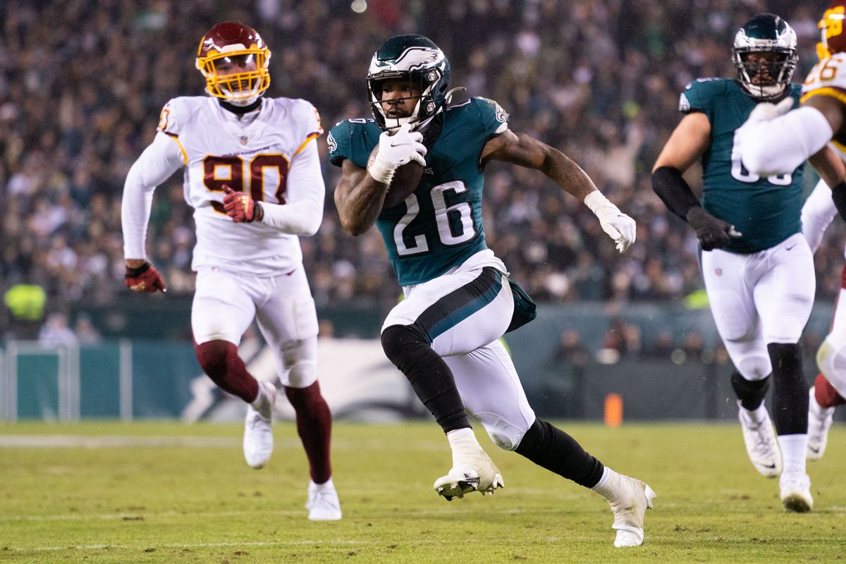 Philadelphia Eagles running back Miles Sanders (26) runs with the ball against the Washington Football Team during the second quarter at Lincoln Financial Field.
