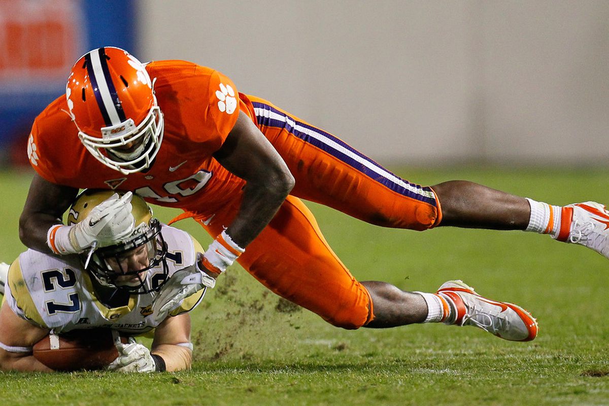 ATLANTA, GA - OCTOBER 29:  Andre Branch #40 of the Clemson Tigers tackles Preston Lyons #27 of the Georgia Tech Yellow Jackets at Bobby Dodd Stadium on October 29, 2011 in Atlanta, Georgia.  (Photo by Kevin C. Cox/Getty Images)