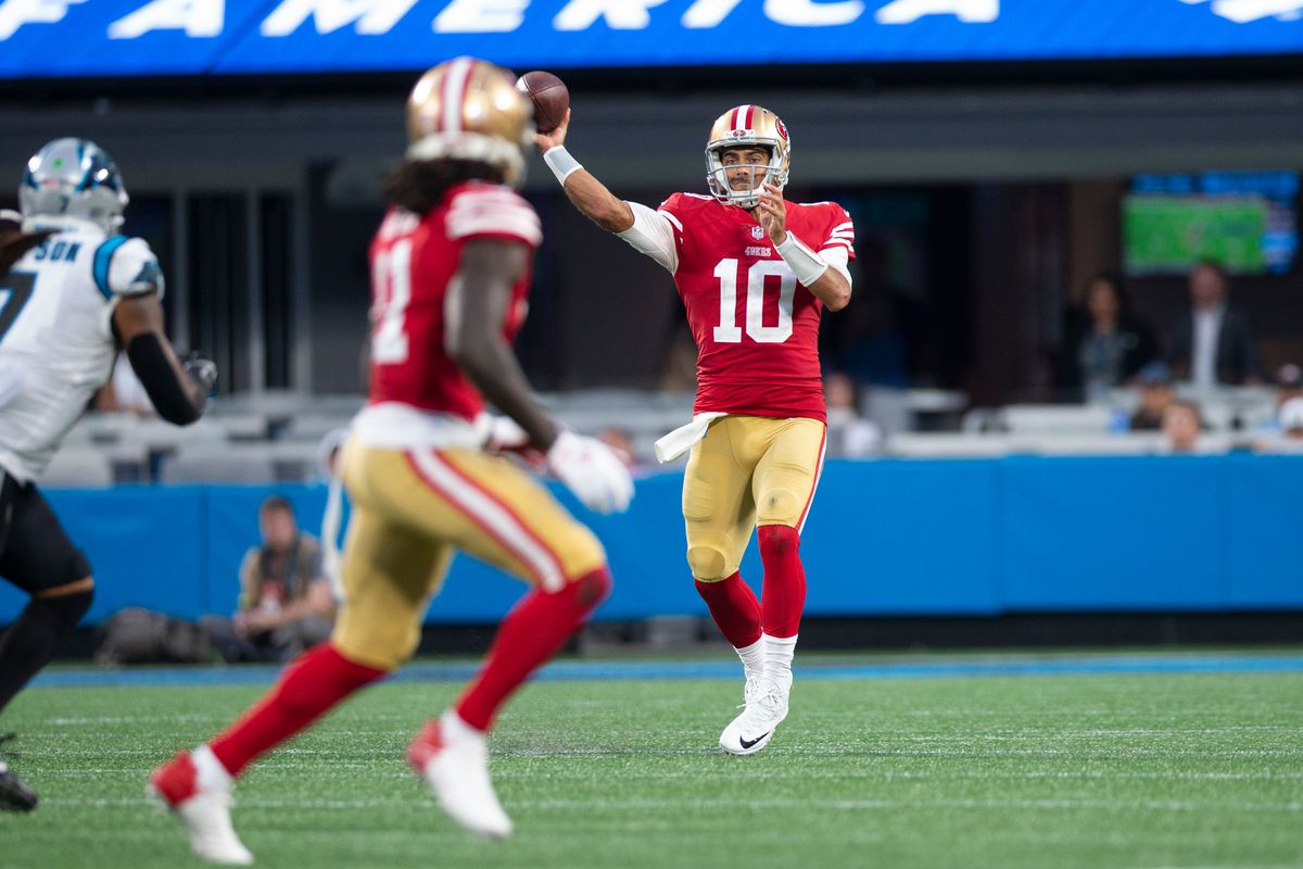 Jimmy Garoppolo #10 of the San Francisco 49ers passes during the game against the Carolina Panthers at Bank of America Stadium on October 9, 2022 in Charlotte, North Carolina.