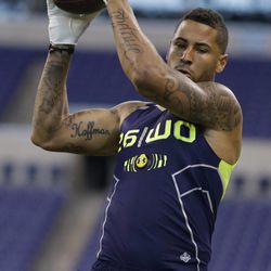 BYU wide receiver Cody Hoffman makes a catch during a drill at the NFL Scouting Combine in Indianapolis, Sunday, Feb. 23, 2014.