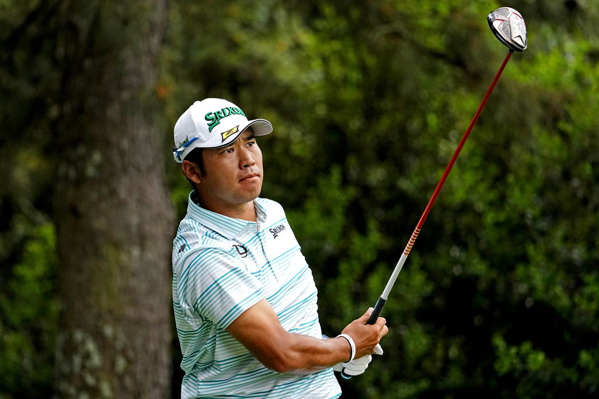 Hideki Matsuyama plays his shot from the 15th tee during the third round of The Masters golf tournament.