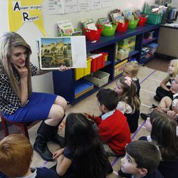 Teacher Natalie Edwards reads to her students at Legacy Preparatory Academy in North Salt Lake City Tuesday, Feb. 24, 2015.