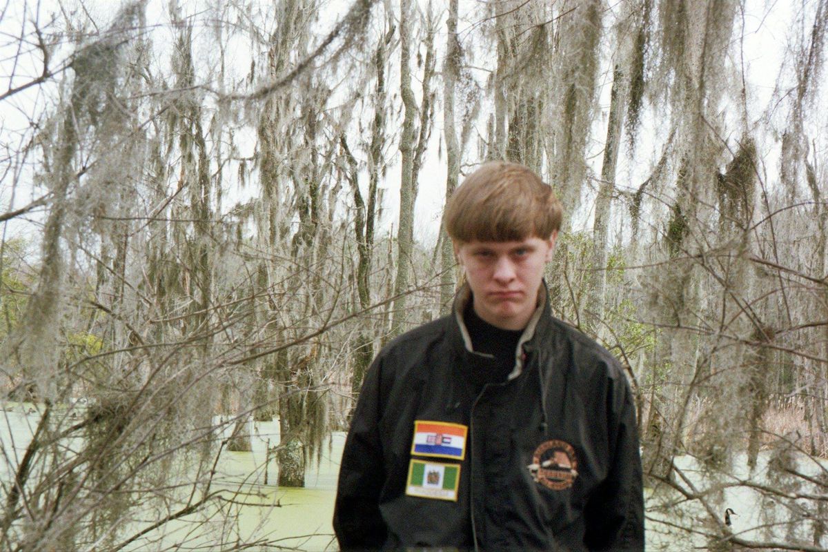 Dylann Roof, the suspect in the Charleston killings, wearing a jacket with flags from apartheid-era South Africa and from Rhodesia.