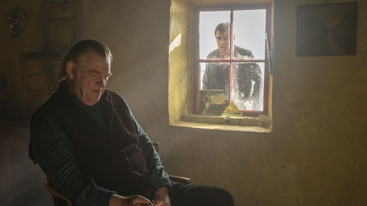 Pádraic (Colin Farrell) peers mournfully through a grubby window into a small Irish cottage where his former friend Colm (Brendan Gleeson) is sitting and staring into space, hands folded in his lap