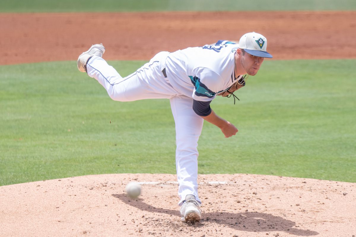 Landen Roupp finishing a pitch for UNC Wilmington