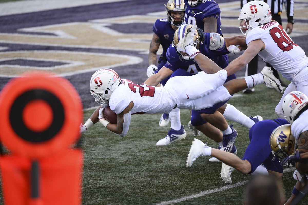 Stanford Cardinal running back Austin Jones dives towards the goal line during a PAC12 football game between the Stanford Cardinal and the Washington Huskies on December 5, 2020 at Husky Stadium in Seattle, WA.