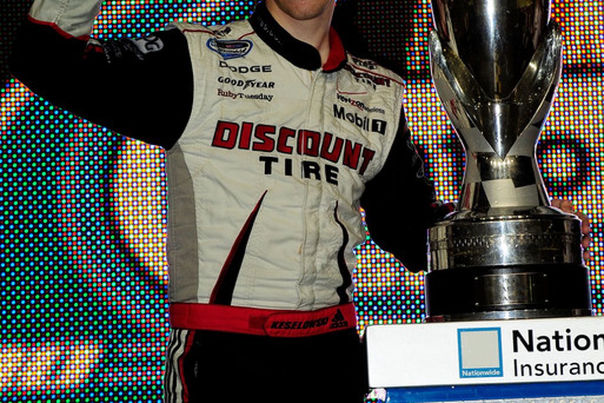 Brad Keselowski celebrates winning the NASCAR Nationwide Series championship following the Ford 300 at Homestead-Miami Speedway.