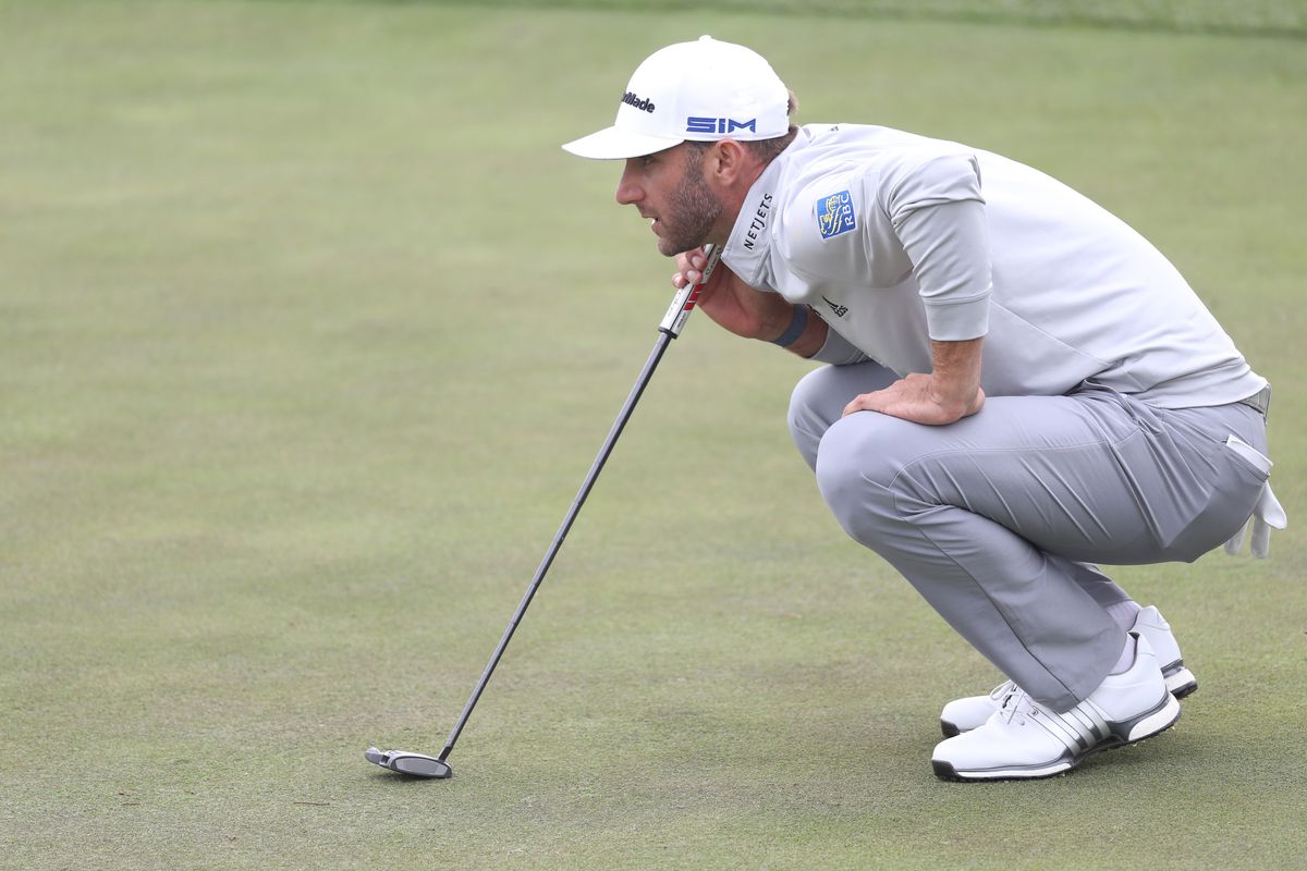 Dustin Johnson of the United States lines up a putt on the 18th green during the third round of the 2020 PGA Championship at TPC Harding Park on August 08, 2020 in San Francisco, California.