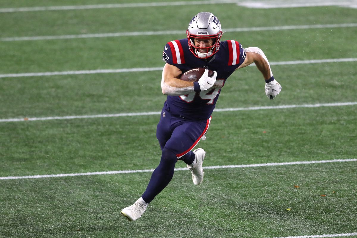 Rex Burkhead #34 of the New England Patriots runs the ball in for a touchdown against the Baltimore Ravens at Gillette Stadium on November 15, 2020 in Foxborough, Massachusetts.