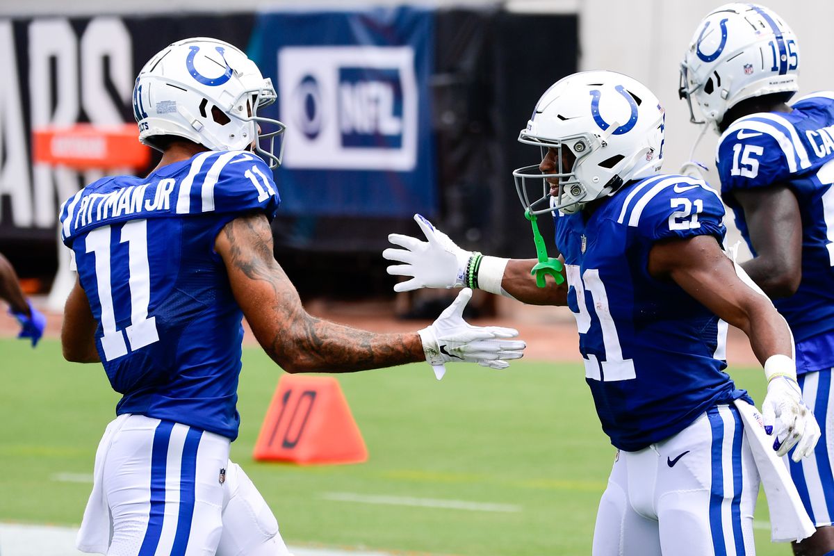 Indianapolis Colts running back Nyheim Hines (21) celebrates with wide receiver Michael Pittman Jr. (11) after scoring a touchdown during the first quarter against the Jacksonville Jaguars at TIAA Bank Field.&nbsp;