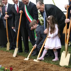 President Monson is assisted at the Oct. 23, 2010, groundbreaking ceremony for the Rome Italy Temple by 7-year old Samuele Lord and his younger sister, Talia Lord, 5, of Naples, Italy. To President Monson's right is Rome Vice-Mayor Giuseppe Ciardi. To his left is Italian Senator Lucio Malan.