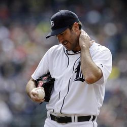 Detroit Tigers starting pitcher Justin Verlander reacts after giving up a two-run home run to New York Yankees' Jayson Nix during the second inning of a baseball game in Detroit, Sunday, April 7, 2013. 