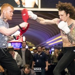 Sean O’Malley shows off his hands at UFC 222 workouts.