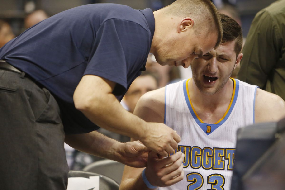Jusuf Nurkic gets his hand worked on
