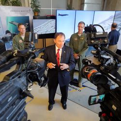 Utah Gov. Gary R. Herbert talks with media after taking a ride Wednesday, Oct. 7, 2015, in an F-35 cockpit demonstrator, at the University of Utah. Lockheed Martin and Hill Air Force Base, teamed up to bring the demonstrator to the Rio Tinto Kennecott Mechanical Engineering Building. 