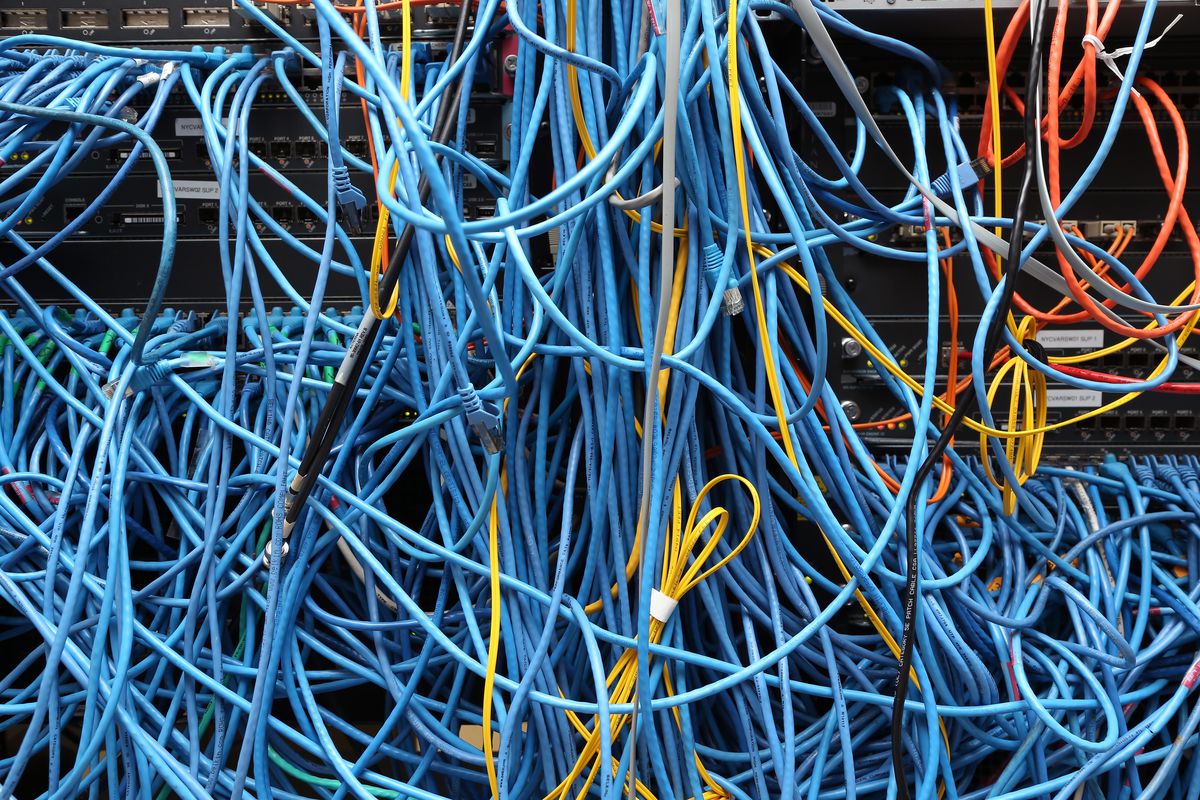 Network cables are plugged in a server room on November 10, 2014 in New York City.