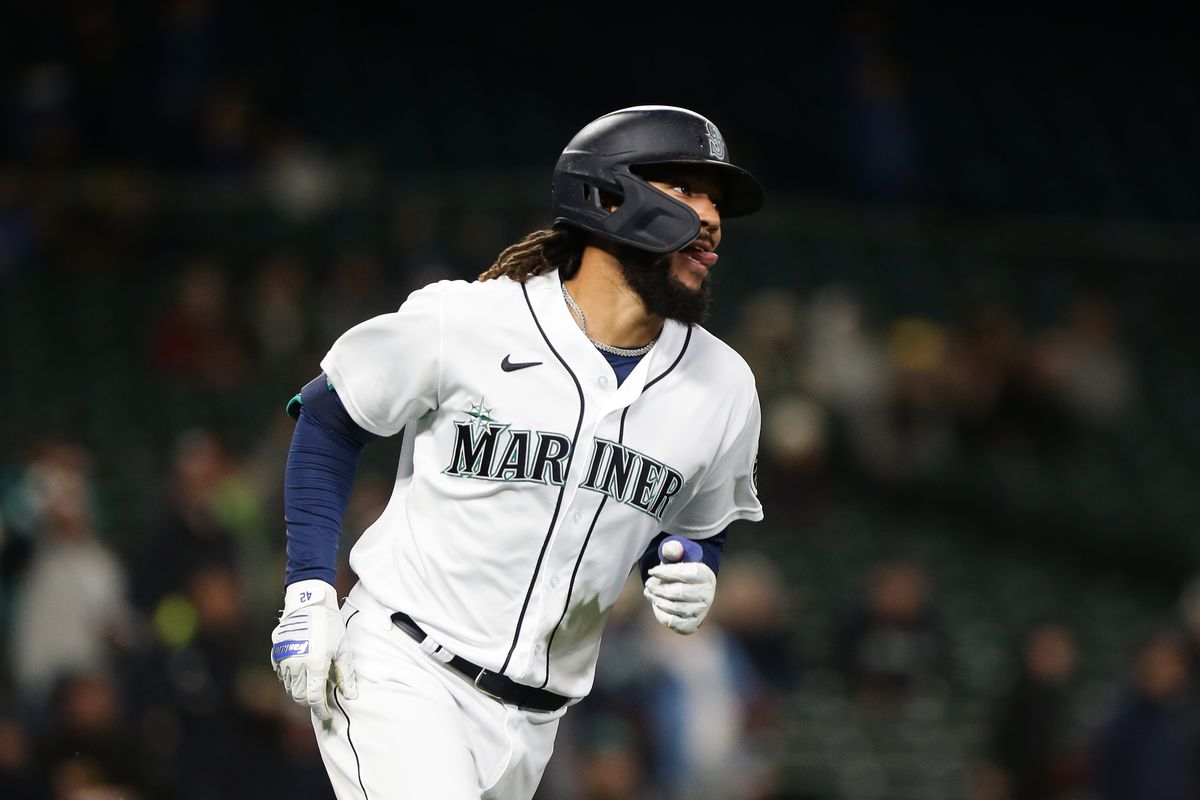 Seattle Mariners shortstop J.P. Crawford (3) reacts as he runs the bases after hitting a three-run home run against the Texas Rangers during the first inning at T-Mobile Park.