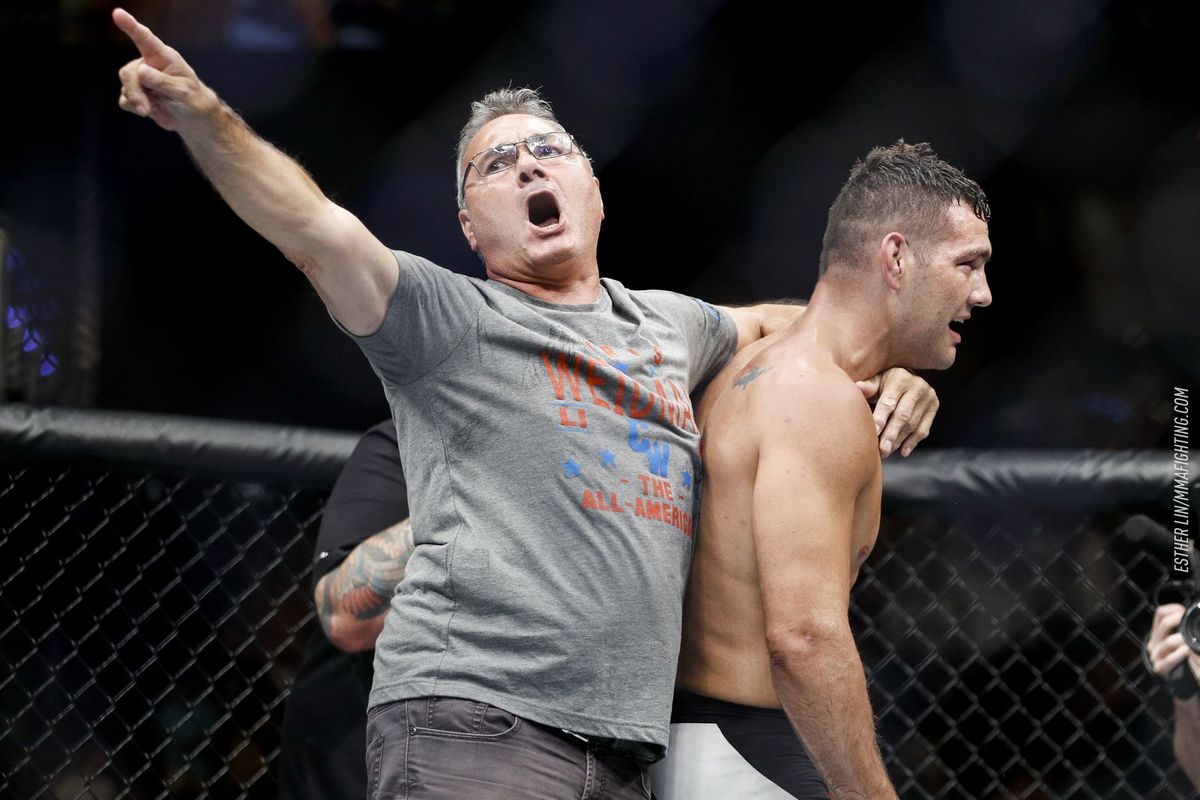 Chris Weidman’s father celebrates after his son defeats Kelvin Gastelum at UFC on FOX 25.