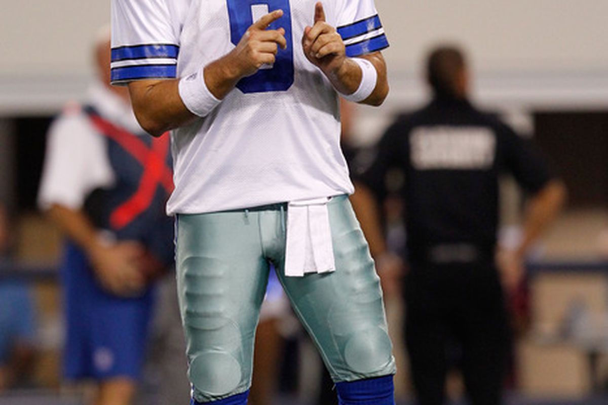 ARLINGTON, TX - SEPTEMBER 26:  Tony Romo #9 of the Dallas Cowboys signals on the field against the Washington Redskins during their game at Cowboys Stadium on September 26, 2011 in Arlington, Texas.  (Photo by Tom Pennington/Getty Images)