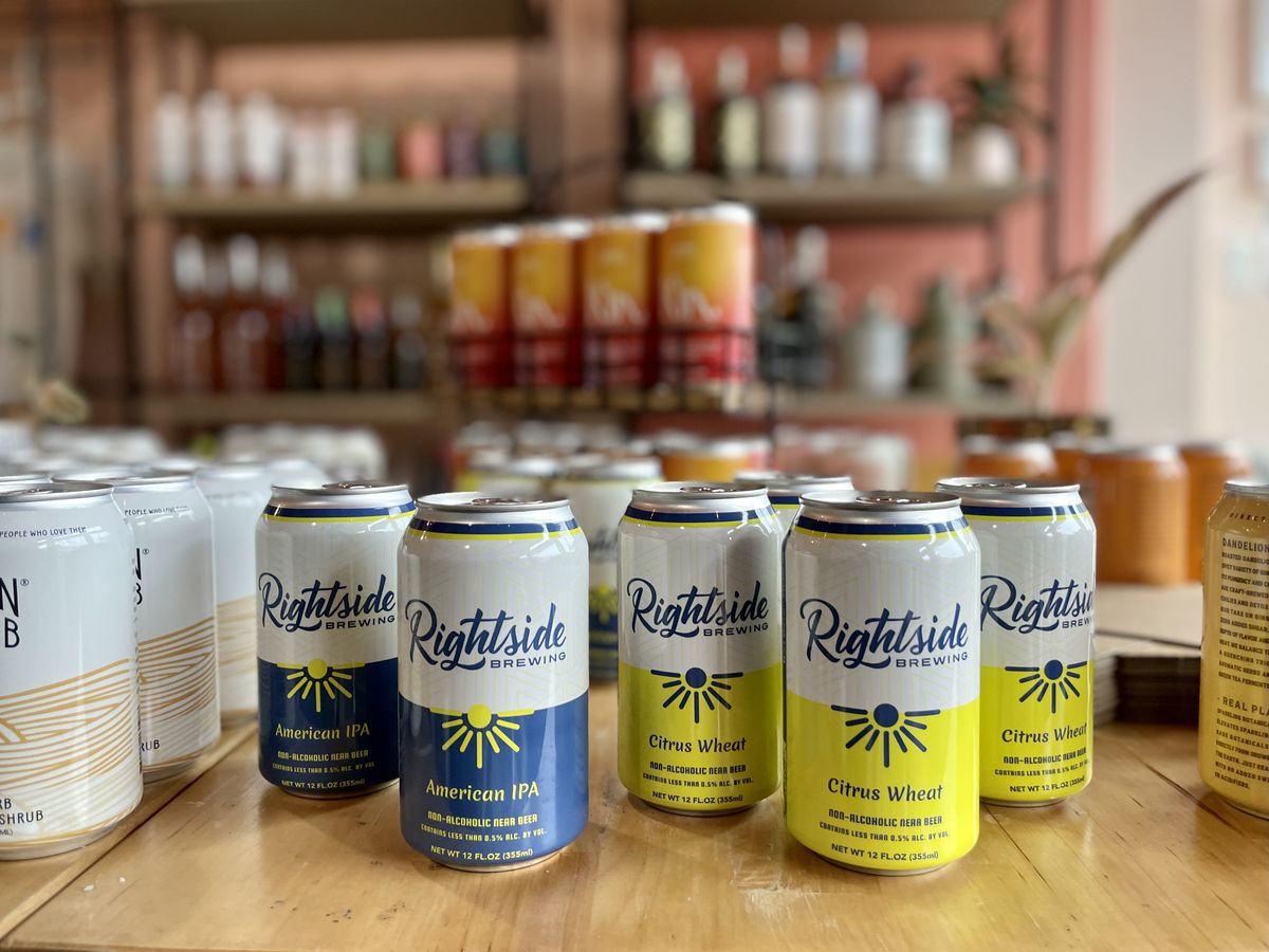 Blue and yellow cans of non-alcoholic beer from Atlanta’s Rightside Brewing.