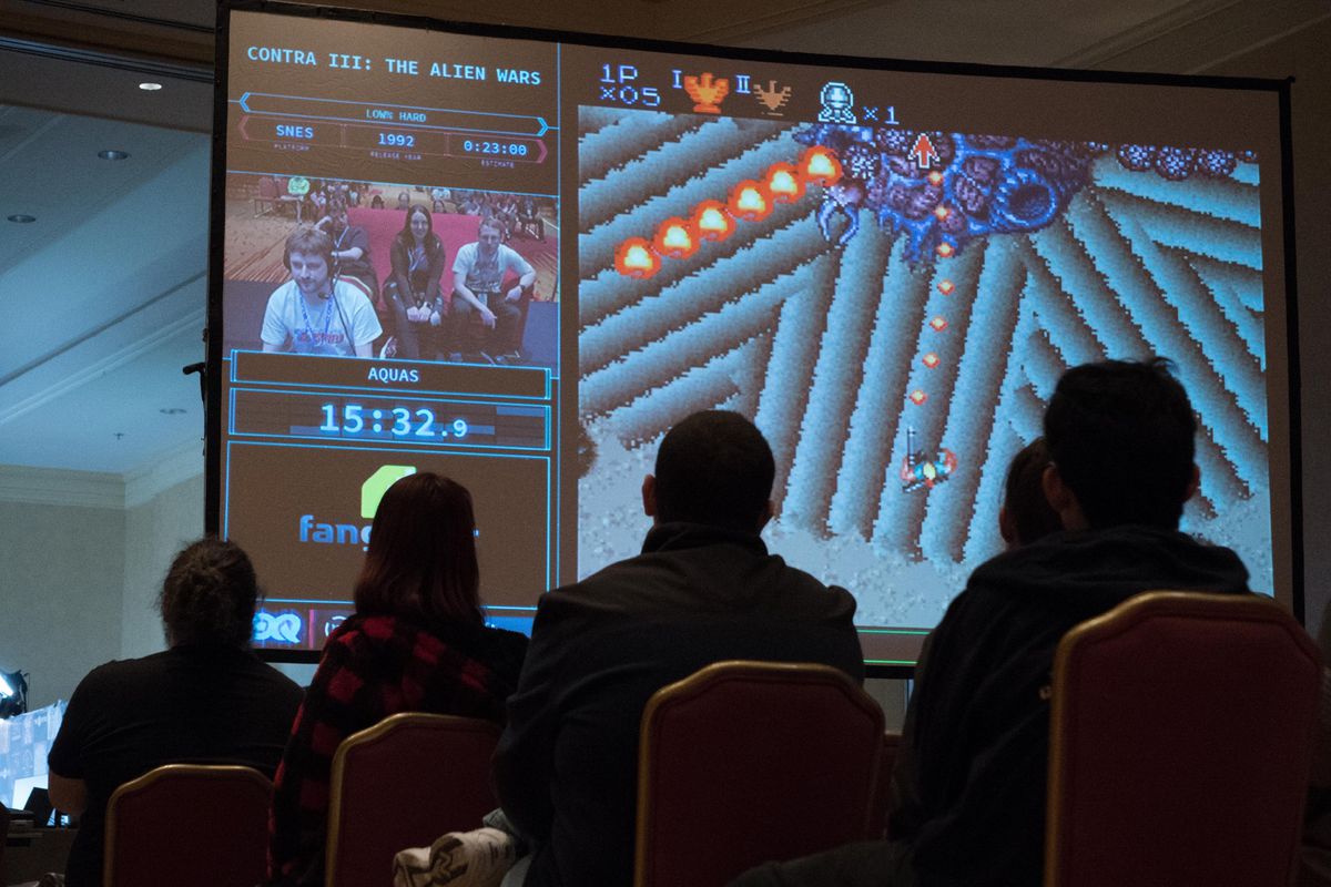 Speedrunner Aquas plays Contra 3: The Alien Wars onscreen at a Games Done Quick event.