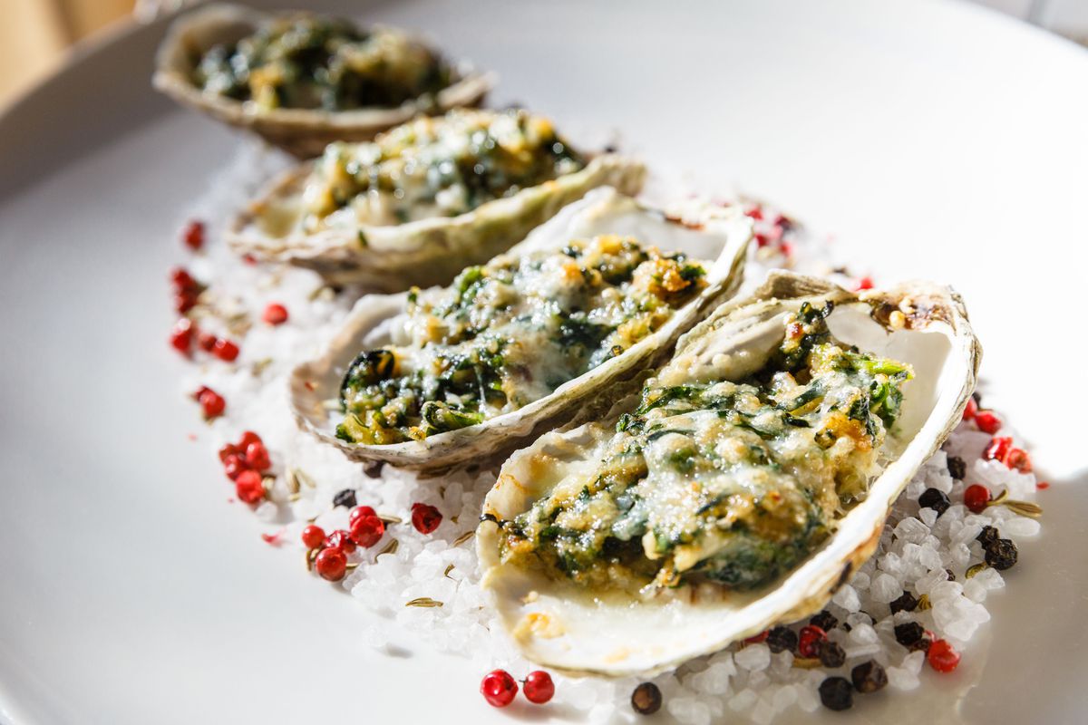 Roasted oysters with with chopped spinach, swiss chard, and ouzo at Eléa