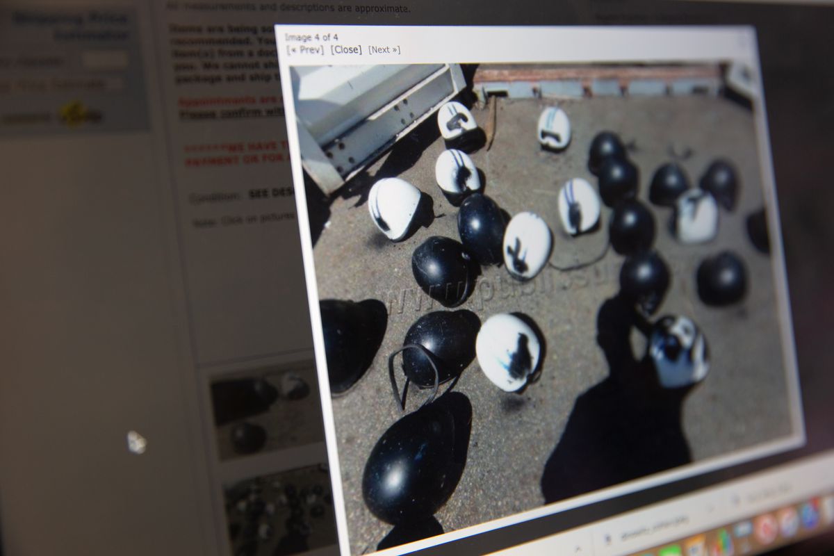 The city was selling used riot helmets on a public surplus site.