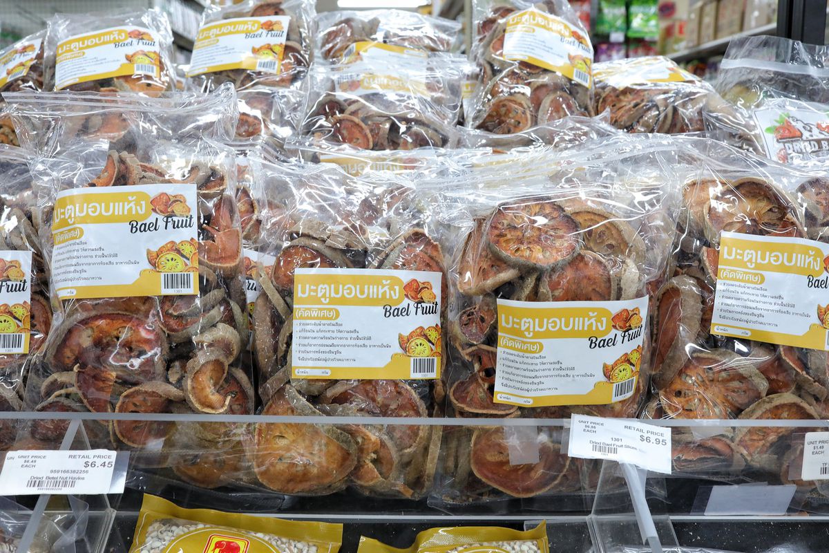 Bags of dried orange and brown fruit slices