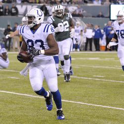 Indianapolis Colts tight end Dwayne Allen scores unchallenged on a pass from quarterback Andrew Luck, not pictured, during the first half of an NFL football game against the New York Jets, Monday, Dec. 5, 2016, in East Rutherford, N.J. 