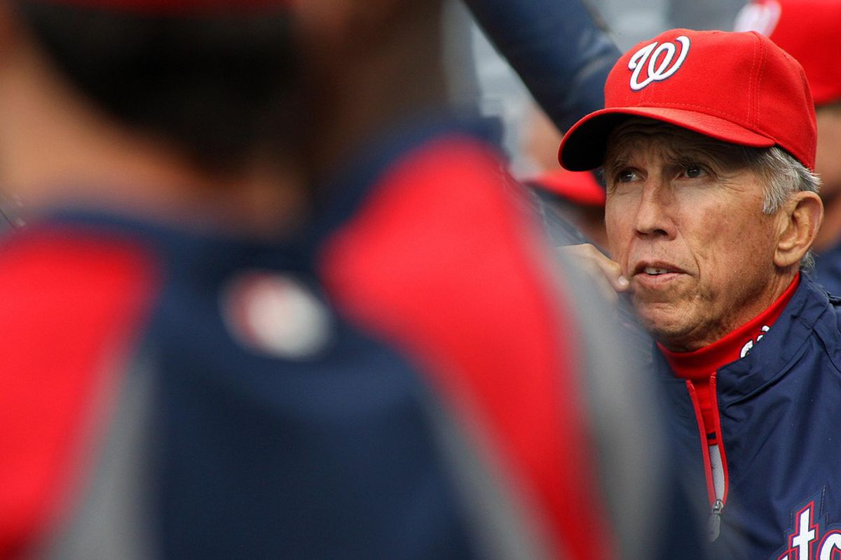 Apr 24, 2012; San Diego, CA, USA; Washington Nationals manager Davey Johnson (right) during batting practice before a game against the San Diego Padres at PETCO Park.  Mandatory Credit: Jake Roth-US PRESSWIRE