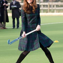 For some field hockey fun on November 30th, 2012, Kate wears an Alexander McQueen tartan coatdress.