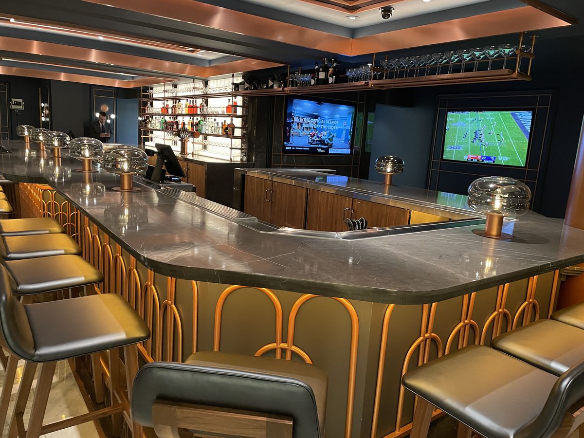 The bar inside Ramsay’s Kitchen with copper elements.