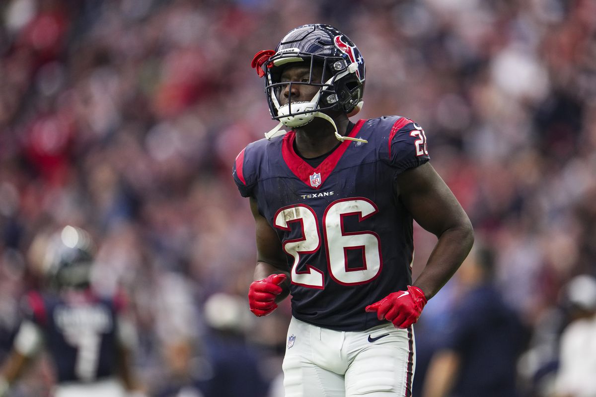 Devin Singletary #26 of the Houston Texans looks on from the field during an NFL football game against the Tennessee Titans at NRG Stadium on December 31, 2023 in Houston, Texas.