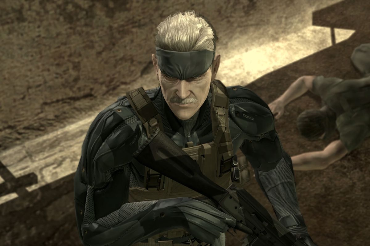 Solid Snake stands in a deserted city street in a screenshot from Metal Gear Solid 4: Guns of the Patriots