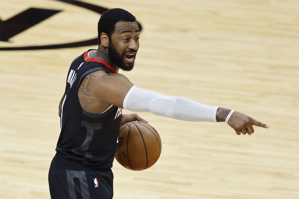 John Wall of the Houston Rockets reacts against the Miami Heat during the second quarter at American Airlines Arena on April 19, 2021 in Miami, Florida.