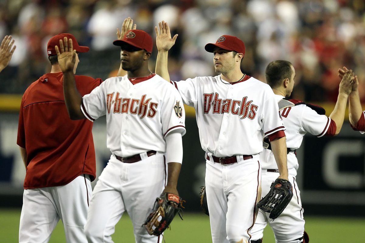 The Diamondbacks now do air-high-5s so as not to injure each other. (Photo by Christian Petersen/Getty Images)