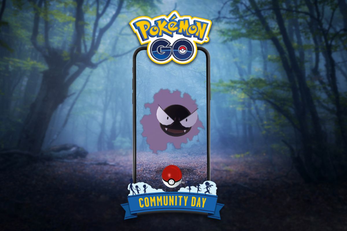 A Gastly visible through a phone’s AR camera floats around in a dark forest