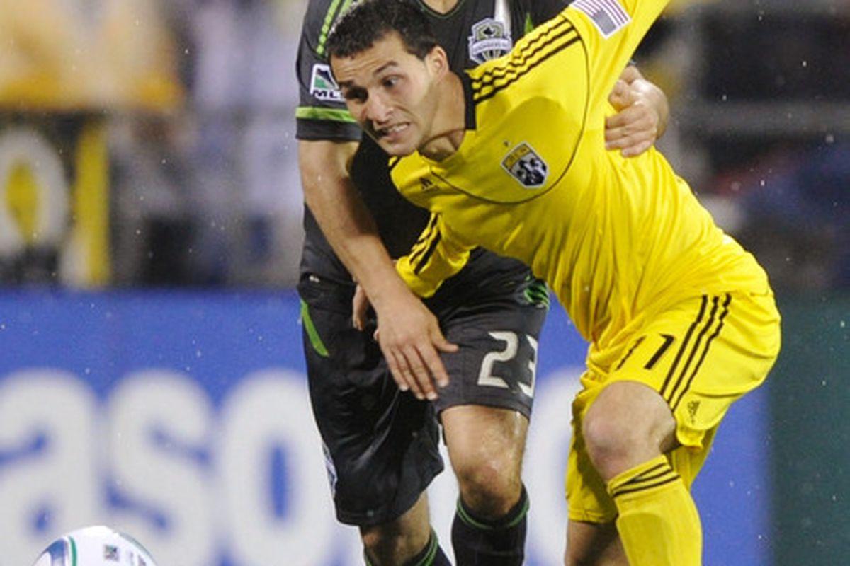 COLUMBUS, OH - MAY 7:  Dilly Duka #11 of the Columbus Crew and Servando Carrasco #23 of the Seattle Sounders battle for control of the ball on May 7, 2011 at Crew Stadium in Columbus, Ohio.  (Photo by Jamie Sabau/Getty Images)