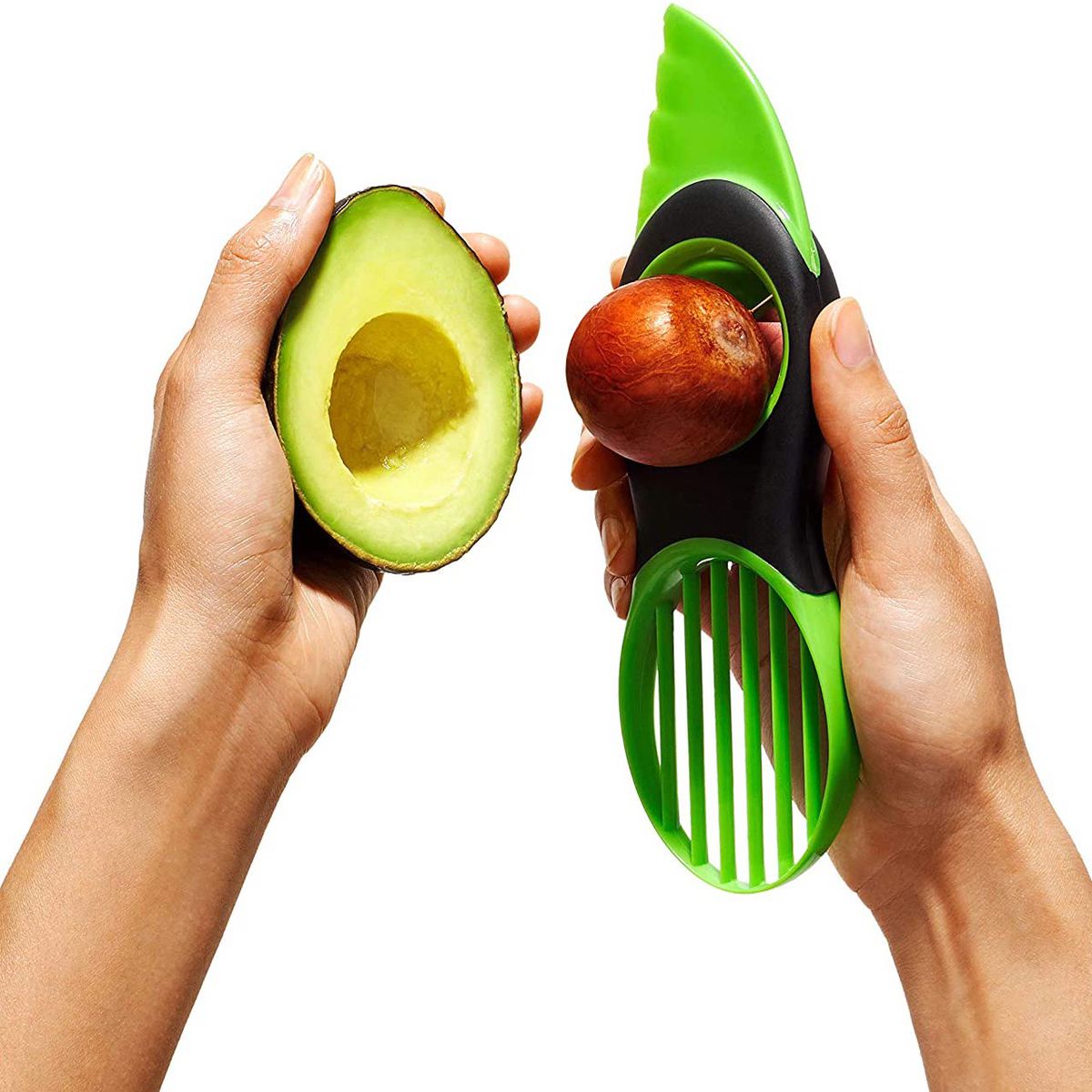 An avocado and an avocado slicer 