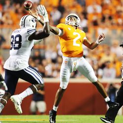 BYU’s (88) JJ Nwigwe tries to catch Tennessee Volunteers quarterback Jarrett Guarantano (2) as BYU and Tennessee play in Knoxville on Saturday, Sept. 7, 2019.