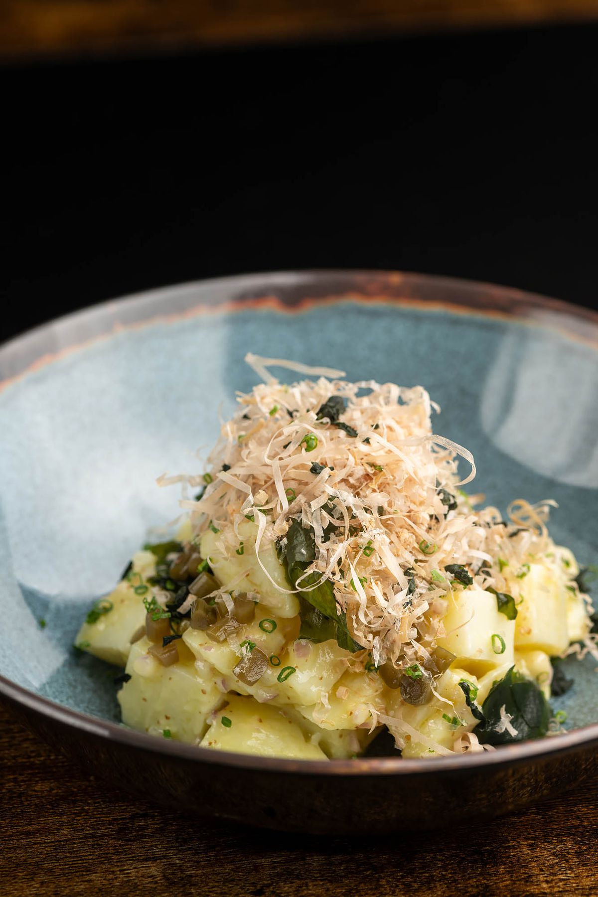 Japanese style potato salad with wakame, mustard, pickled garlic stems, furikake, and bonito flakes at the Airliner.
