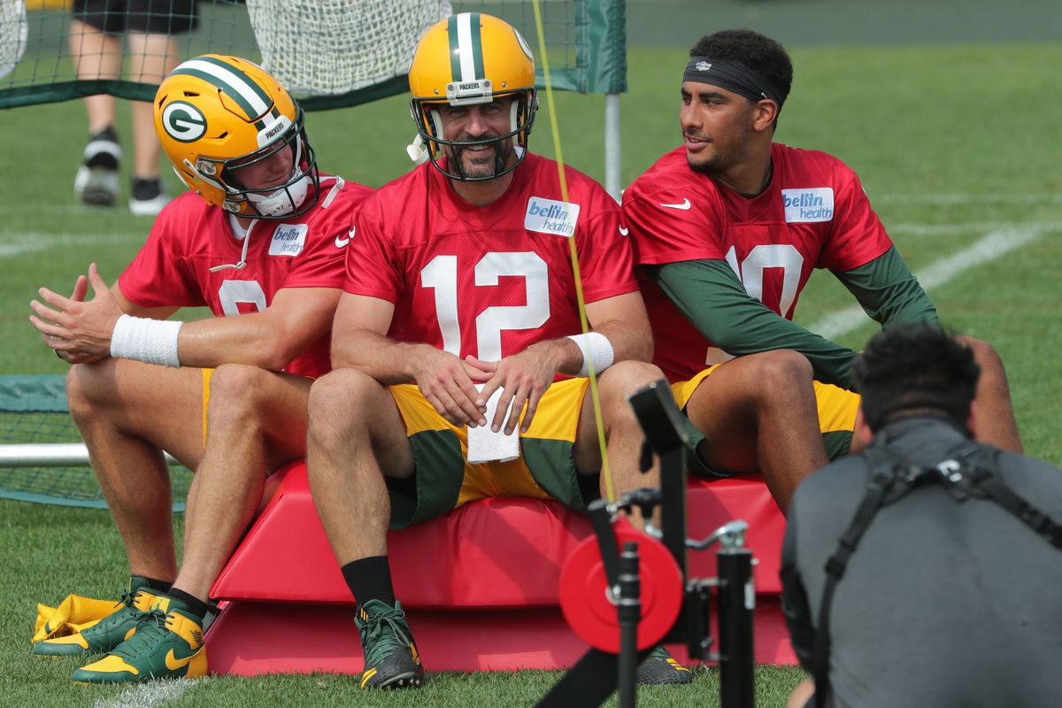 Green Bay Packers quarterback Aaron Rodgers is shown with back up quarterbacks Tim Boyle, left, and Jordan Love Monday, August 24, 2020 during the team’s training camp in Green Bay, Wis.