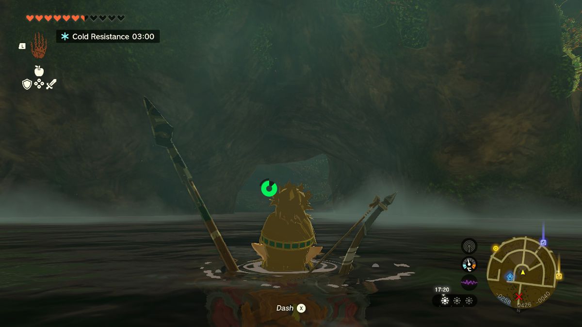 Link swims in a pool of water in a cave in Zelda Tears of the Kingdom.