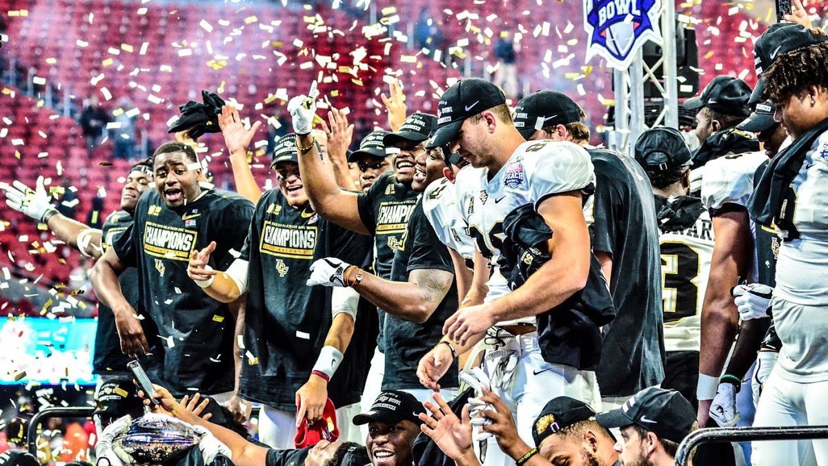 The UCF Knights celebrate their Peach Bowl victory -- and national championship -- in Atlanta on Jan. 1. (Photo: Derek Warden)