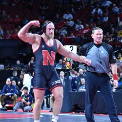 Nebraska’s Christian Lance gets his hand raised after beating Purdue’s Michael Woulfe in the first round of the Big Ten Championships Saturday at the Pinnacle Bank Arena in Lincoln.