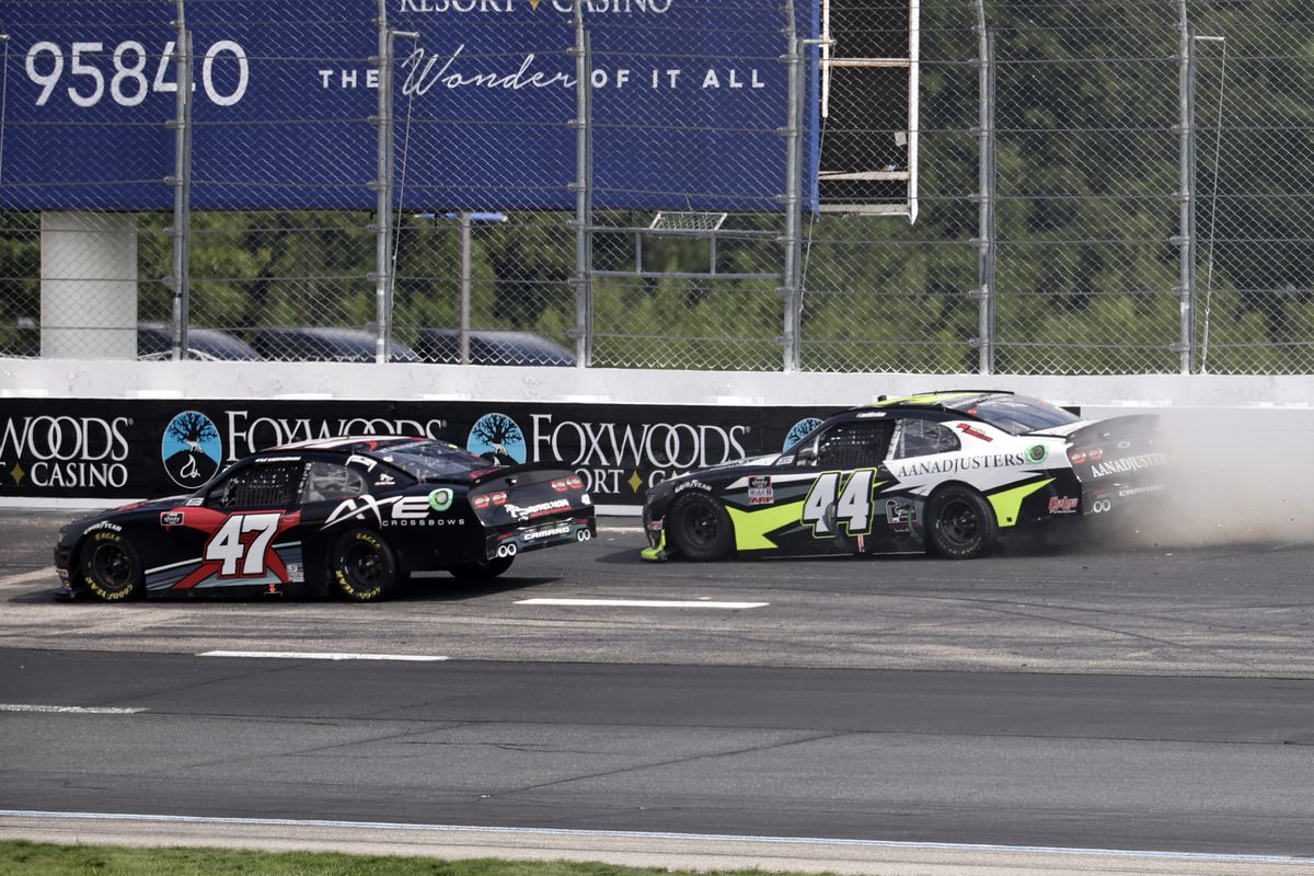 Tommy Joe Martins, driver of the (44) AAN Adjusters Chevrolet, hits the wall in turn 2 during the Xfinity Series - Ambetter Get Vaccinated 200 on July 17, 2021 at New Hampshire Motor Speedway in Loudon, New Hampshire.