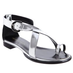 <b>Proenza Schouler</b>, <a href="http://www.barneys.com/Proenza-Schouler-Metallic-Criss-Cross-Flat-Sandal/502468301,default,pd.html?cgid=womens-shoes&index=0">$750</a>
